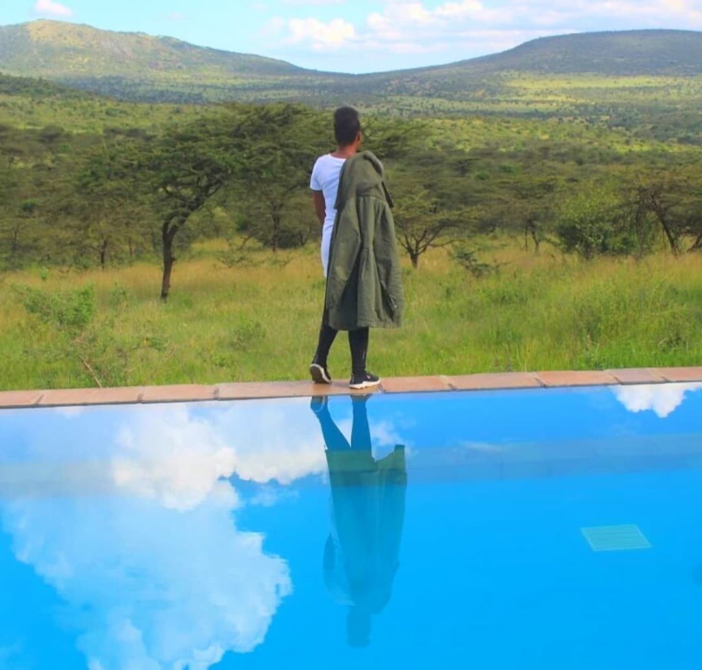 The sky and Subject incredibly reflect on the swimming pool. Image Credit Pam